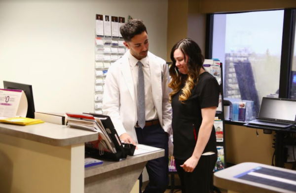 Urologist Speaking with NP